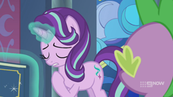 Size: 1280x720 | Tagged: safe, imported from derpibooru, screencap, spike, starlight glimmer, dragon, pony, unicorn, memories and more, spoiler:memories and more, spoiler:mlp friendship is forever, 9now, book, eyes closed, levitation, magic, magic aura, pointing at self, scrapbook, telekinesis, winged spike, wings