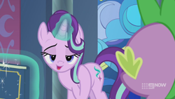 Size: 1280x720 | Tagged: safe, imported from derpibooru, screencap, spike, starlight glimmer, dragon, pony, unicorn, memories and more, spoiler:memories and more, spoiler:mlp friendship is forever, 9now, bedroom eyes, book, duo, levitation, looking at you, magic, magic aura, mid-blink screencap, scrapbook, telekinesis, winged spike, wings