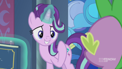 Size: 1280x720 | Tagged: safe, imported from derpibooru, screencap, spike, starlight glimmer, dragon, pony, unicorn, memories and more, spoiler:memories and more, spoiler:mlp friendship is forever, 9now, book, duo, levitation, looking at each other, magic, magic aura, scrapbook, smiling, telekinesis, winged spike, wings