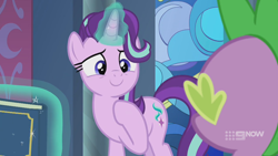 Size: 1280x720 | Tagged: safe, imported from derpibooru, screencap, spike, starlight glimmer, dragon, pony, unicorn, memories and more, spoiler:memories and more, spoiler:mlp friendship is forever, 9now, book, duo, levitation, looking at each other, magic, magic aura, scrapbook, smiling, telekinesis, winged spike, wings