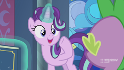 Size: 1280x720 | Tagged: safe, imported from derpibooru, screencap, spike, starlight glimmer, dragon, pony, unicorn, memories and more, spoiler:memories and more, spoiler:mlp friendship is forever, 9now, book, duo, levitation, looking at each other, magic, magic aura, scrapbook, smiling, telekinesis, winged spike, wings