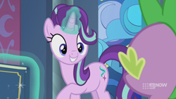 Size: 1280x720 | Tagged: safe, imported from derpibooru, screencap, spike, starlight glimmer, dragon, pony, unicorn, memories and more, spoiler:memories and more, spoiler:mlp friendship is forever, 9now, book, duo, levitation, looking at each other, magic, magic aura, scrapbook, smiling, telekinesis, winged spike, wings