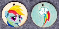 Size: 1014x507 | Tagged: safe, artist:malte279, imported from derpibooru, rainbow dash, pony, craft, cutie mark, jewelry, pendant, traditional art, wood