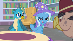 Size: 1920x1080 | Tagged: safe, imported from derpibooru, screencap, gallus, grampa gruff, trixie, griffon, pony, unicorn, a horse shoe-in, blind eye, cape, clothes, eye scar, female, hat, male, mare, scar, trio, trixie's cape, trixie's hat