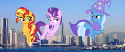 Size: 4000x1679 | Tagged: safe, artist:8-notes, artist:cloudy glow, artist:cloudyglow, artist:starlessnight22, artist:theotterpony, edit, imported from derpibooru, vector edit, starlight glimmer, sunset shimmer, trixie, pony, unicorn, female, giant pony, giant starlight glimmer, giant trixie, giant unicorn, giant/macro sunset shimmer, highrise ponies, irl, japan, lidded eyes, macro, mare, mega trixie, photo, ponies in real life, s5 starlight, smiling, smirk, trio, vector, yokohama