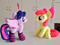 Size: 1024x768 | Tagged: safe, artist:nekokevin, imported from derpibooru, apple bloom, twilight sparkle, alicorn, earth pony, pony, 4de, clothes, duo, exclamation point, female, filly, irl, looking at each other, mare, photo, plushie, ponies in socks, sitting, smiling, socks, spread wings, starlight's little twibird, striped socks, twilight sparkle (alicorn), wings