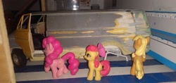 Size: 3264x1546 | Tagged: safe, imported from derpibooru, apple bloom, applejack, pinkie pie, blind bag, everfree customs, female, garage, irl, photo, toy, van, workbench