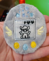 Size: 1647x2048 | Tagged: safe, artist:sew_adorkable, artist:trashkitten-plushies, imported from derpibooru, derpy hooves, pegasus, pony, cute, derpabetes, embroidery, irl, photo, plushie, solo, tamagotchi