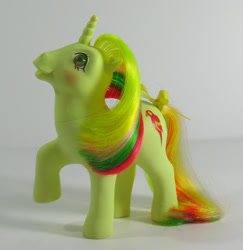 Size: 583x600 | Tagged: safe, imported from derpibooru, photographer:breyer600, mimic (g1), pony, twinkle eyed pony, unicorn, bow, g1, irl, photo, tail bow, toy