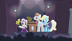 Size: 1280x720 | Tagged: safe, imported from derpibooru, screencap, eclair créme, jangles, star gazer, sweetie belle, earth pony, pony, unicorn, for whom the sweetie belle toils, audience, award, award show, awards, background pony, background pony audience, clothes, curtains, dress, female, filly, hoof hold, lectern, male, mare, microphone, podium, ribbon, spotlight, stage, stallion, trophy, victory