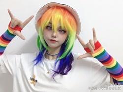 Size: 1334x1001 | Tagged: safe, artist:我是言妄, imported from derpibooru, rainbow dash, human, arm warmers, clothes, cosplay, costume, female, hand gesture, hat, irl, irl human, looking at you, photo, shirt, solo, t-shirt