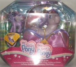 Size: 670x587 | Tagged: safe, imported from derpibooru, photographer:collector1, fluttershy (g3), breezie, french, g3, hilarious in hindsight, irl, lady slipper, packaging, photo, spanish, toy