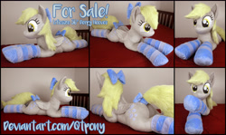 Size: 5141x3060 | Tagged: safe, artist:qtpony, imported from derpibooru, derpy hooves, pony, bow, clothes, hair bow, irl, life size, lying down, photo, plushie, prone, socks, solo, stockings, striped socks, tail bow