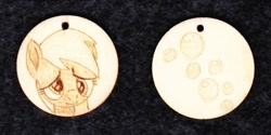 Size: 1024x513 | Tagged: safe, artist:malte279, imported from derpibooru, derpy hooves, pegasus, pony, craft, cutie mark, female, jewelry, pendant, pyrography, traditional art, wood