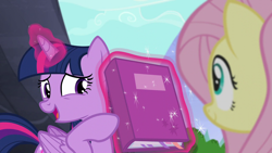 Size: 1280x720 | Tagged: safe, imported from derpibooru, screencap, fluttershy, twilight sparkle, alicorn, pony, the hooffields and mccolts, book, duo, female, magic, mare, twilight sparkle (alicorn)