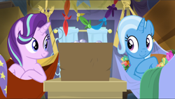 Size: 1666x941 | Tagged: safe, imported from derpibooru, screencap, starlight glimmer, trixie, road to friendship, bed, box, cropped, cute, diatrixes, duo, female, glimmerbetes, looking at each other, lying down, lying on bed, on bed, smiling