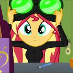 Size: 522x529 | Tagged: safe, imported from derpibooru, screencap, sunset shimmer, equestria girls, equestria girls series, holidays unwrapped, spoiler:eqg series (season 2), breasts, canterlot high, cropped, female, goggles, imagine spot, lockers, night vision goggles, pencil, solo, stealth suit, winter break-in