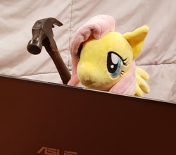 Size: 702x618 | Tagged: safe, imported from derpibooru, fluttershy, pegasus, pony, asus, computer, explicit source, hammer, irl, photo, plushie, solo