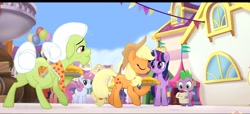 Size: 1813x826 | Tagged: safe, imported from derpibooru, screencap, applejack, glitter glow, granny smith, spike, twilight sparkle, alicorn, earth pony, pony, unicorn, my little pony: the movie, clothes, granny smith's scarf, granny smith's shawl, happy, pie sisters, siblings, singing, sisters, twilight sparkle (alicorn), we got this together