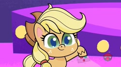 Size: 1667x927 | Tagged: safe, imported from derpibooru, screencap, applejack, earth pony, pony, my little pony: pony life, spoiler:pony life s01e46, breaking the fourth wall, cute, female, g4.5, hoof hold, jackabetes, remote, solo, sportacular spectacular musical musak-ular