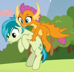 Size: 380x369 | Tagged: safe, imported from derpibooru, screencap, ocellus, sandbar, smolder, dragon, earth pony, pony, school raze, cropped, cute, dragoness, duo focus, female, holding a pony, male, offscreen character, smolderbetes, stallion, surprised