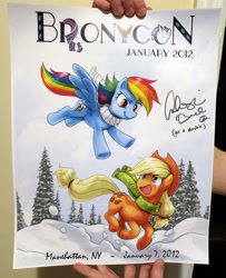 Size: 2430x3000 | Tagged: artist needed, safe, artist:inkynotebook, imported from derpibooru, applejack, rainbow dash, earth pony, pegasus, pony, bronycon 2012, clothes, day, duo, flying, hat, looking at each other, open mouth, photo, poster, running, scarf, signature, smiling, snow, tree