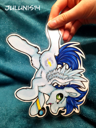 Size: 3000x4000 | Tagged: safe, artist:julunis14, imported from derpibooru, soarin', pegasus, pony, backwards cutie mark, chest fluff, commission, ear fluff, goggles, holding a pony, leg fluff, male, markers, open mouth, paper pony, photo, solo, spread wings, traditional art, upside down, wings