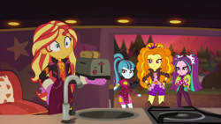 Size: 1334x750 | Tagged: safe, imported from derpibooru, screencap, adagio dazzle, aria blaze, sonata dusk, sunset shimmer, equestria girls, equestria girls series, sunset's backstage pass!, spoiler:eqg series (season 2), bread, caught, female, food, geode of empathy, magical geodes, minidress, oven mitts, shocked, taco dress, the dazzlings, the dazzlings tour bus, toast, toaster, trio, trio female