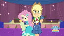 Size: 1136x640 | Tagged: safe, imported from derpibooru, screencap, applejack, fluttershy, best in show: the pre-show, equestria girls, equestria girls series, spoiler:eqg series (season 2), animated, cute, fluttershy being fluttershy, host, microphone, paper, podium, script, shy, shyabetes, sound, stage, webm