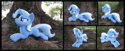 Size: 4237x1754 | Tagged: safe, artist:peruserofpieces, imported from derpibooru, trixie, pony, unicorn, beanie (plushie), cocky, female, horn, irl, looking at you, lying down, mare, photo, plushie, prone, smiling, smiling at you, solo, sploot, tree