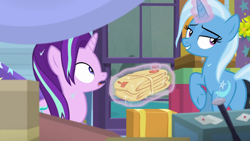 Size: 1280x720 | Tagged: safe, imported from derpibooru, screencap, starlight glimmer, trixie, pony, road to friendship, bedroom eyes, butt, duo, glowing horn, horn, indoors, inflatable raft, lidded eyes, magic, magic aura, plot, raft, trixie's wagon, we're friendship bound, wet, wet mane