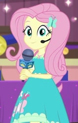 Size: 384x609 | Tagged: safe, imported from derpibooru, screencap, fluttershy, best in show: the victory lap, equestria girls, equestria girls series, spoiler:eqg series (season 2), beautiful, clothes, cute, cutie mark, cutie mark on clothes, dress, dress interior, female, fluttershy boho dress, geode of fauna, headworn microphone, looking at you, magical geodes, micro, microphone, shyabetes, smiling, smiling at you
