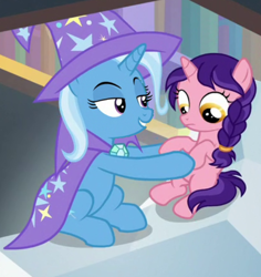 Size: 620x658 | Tagged: safe, edit, edited screencap, imported from derpibooru, screencap, candy grapes, raspberry dazzle, trixie, pony, the ending of the end, bedroom eyes, female, filly, grin, holding a pony, implied foalcon, lidded eyes, smiling