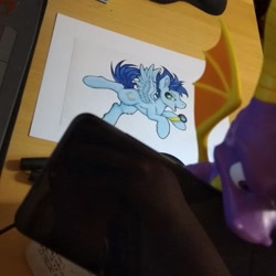 Size: 720x720 | Tagged: safe, artist:julunis14, imported from derpibooru, soarin', pegasus, pony, aviator goggles, desk, flying, goggles, male, photo, spyro the dragon, spyro the dragon (series), stallion, toy, traditional art