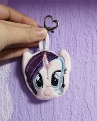 Size: 1080x1350 | Tagged: safe, artist:rxndxm.artist, imported from derpibooru, oc, oc only, pony, unicorn, bust, female, horn, irl, keychain, mare, photo, plushie, smiling, solo, unicorn oc