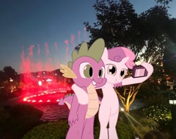 Size: 978x774 | Tagged: safe, artist:hoodie-stalker, edit, editor:undeadponysoldier, imported from ponybooru, photographer:undeadponysoldier, neon lights, rising star, spike, sweetie belle, pony, arm around back, beautiful, bipedal, camera, colored lights, cute, diasweetes, dragons in real life, edited photo, female, fountain, happy, hug, irl, light, lights, male, night, older, older spike, older sweetie belle, phone, photo, pigeon forge, ponies in real life, red light, selfie, shipping, side hug, spikabetes, spikebelle, straight, tennessee, water