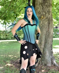 Size: 1080x1350 | Tagged: safe, artist:chiado33, imported from derpibooru, queen chrysalis, human, clothes, cosplay, costume, czequestria, hand on hip, irl, irl human, nail polish, photo, sleeveless, tree