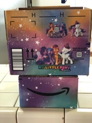 Size: 1108x1478 | Tagged: safe, imported from derpibooru, izzy moonbow, pipp petals, sunny starscout, zipp storm, earth pony, pegasus, pony, unicorn, spoiler:my little pony: a new generation, amazon.com, box, g5, irl, my little pony: a new generation, photo
