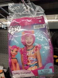 Size: 3120x4160 | Tagged: safe, imported from derpibooru, sunny starscout, earth pony, human, pony, clothes, costume, g5, halloween, halloween costume, irl, looking at you, my little pony logo, my little pony: a new generation, photo, pony costume, walmart, wig