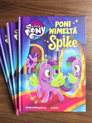 Size: 3024x4032 | Tagged: safe, artist:anthony conley, imported from derpibooru, photographer:anthony conley, spike, twilight sparkle, alicorn, pegasus, pony, a pony named spike, book, book cover, colt, cover, female, finnish, happy, implied transformation, indoors, logo, male, mare, mirror, my little pony logo, open mouth, open smile, photo, poni nimeltä spike, ponified, ponified spike, reflection, smiling, solo focus, species swap, stallion, twilight sparkle (alicorn)