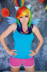 Size: 586x900 | Tagged: safe, artist:jessica nigri, imported from derpibooru, rainbow dash, human, 2015, clothes, cosplay, costume, hand on hip, irl, irl human, photo, shorts, sleeveless, tanktop