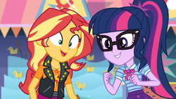 Size: 3410x1920 | Tagged: safe, imported from derpibooru, screencap, sci-twi, sunset shimmer, twilight sparkle, equestria girls, equestria girls series, rollercoaster of friendship, bowtie, clothes, cutie mark, cutie mark on clothes, female, geode of empathy, geode of telekinesis, glasses, high res, jacket, jewelry, leather, leather jacket, magical geodes, necklace, open mouth, ponytail, smiling