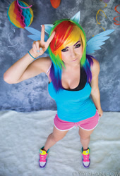 Size: 613x900 | Tagged: safe, artist:purplepluminc, imported from derpibooru, rainbow dash, human, clothes, cosplay, costume, irl, irl human, jessica nigri, peace sign, photo, shorts, sleeveless, tanktop