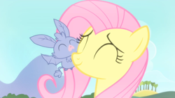 Size: 1280x720 | Tagged: safe, imported from derpibooru, screencap, fluttershy, bat, pegasus, pony, bats!, season 4, ^^, applejack's farm, baby bat, bonding, cute, day, eyes closed, female, outdoors, scary