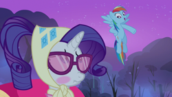 Size: 1280x720 | Tagged: safe, editor:rarity vrymer collective, imported from derpibooru, screencap, rainbow dash, rarity, pegasus, pony, unicorn, season 3, sleepless in ponyville, blushing, camping outfit, clothes, duo, duo female, female, flying, glasses, mare, multicolored hair, multicolored mane, multicolored tail, night, open mouth, scrunchy face, tail
