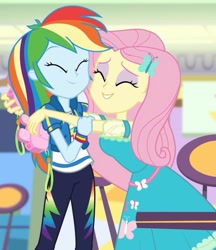 Size: 1453x1680 | Tagged: safe, imported from derpibooru, screencap, fluttershy, rainbow dash, equestria girls, equestria girls series, holidays unwrapped, spoiler:eqg series (season 2), clothes, cropped, cute, daaaaaaaaaaaw, dashabetes, dashing through the mall, eyes closed, eyeshadow, female, geode of fauna, geode of super speed, hairpin, happy, heartwarming, hug, magical geodes, makeup, pants, pink camera, precious, shipping fuel, shyabetes, smiling, sweet dreams fuel