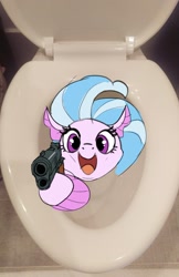 Size: 1181x1823 | Tagged: safe, artist:cadillac-dynamite, imported from derpibooru, silverstream, seapony (g4), cute, delet this, diastreamies, gun, imminent flush, irl, looking at you, open mouth, photo, ponies in real life, solo, toilet, weapon