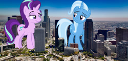 Size: 2200x1050 | Tagged: safe, artist:andoanimalia, artist:reginault, artist:theotterpony, imported from derpibooru, starlight glimmer, trixie, pony, unicorn, california, female, giant pony, giantess, highrise ponies, irl, los angeles, macro, mare, photo, ponies in real life, story included