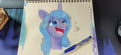 Size: 4000x1800 | Tagged: safe, artist:engi, imported from derpibooru, izzy moonbow, pony, unicorn, cute, female, g5, happy, mare, my little pony: a new generation, open mouth, pencil, photo, simple background, smiling, solo, traditional art, watercolor painting
