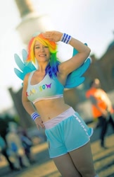 Size: 698x1080 | Tagged: safe, imported from derpibooru, rainbow dash, human, belly button, clothes, cosplay, costume, irl, irl human, photo, salute